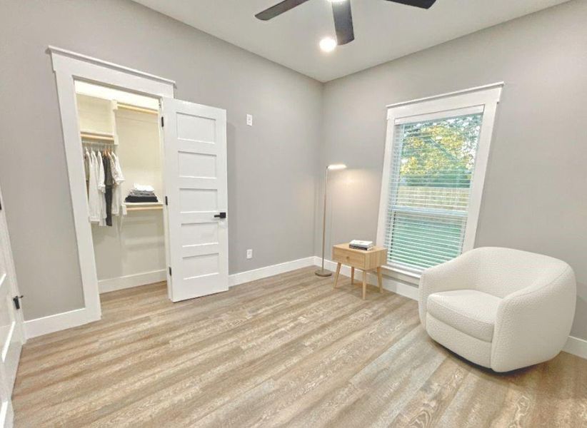 Sitting room featuring light wood-style floors and recessed lighting Sitting room featuring light wood-style floors and recessed lighting
