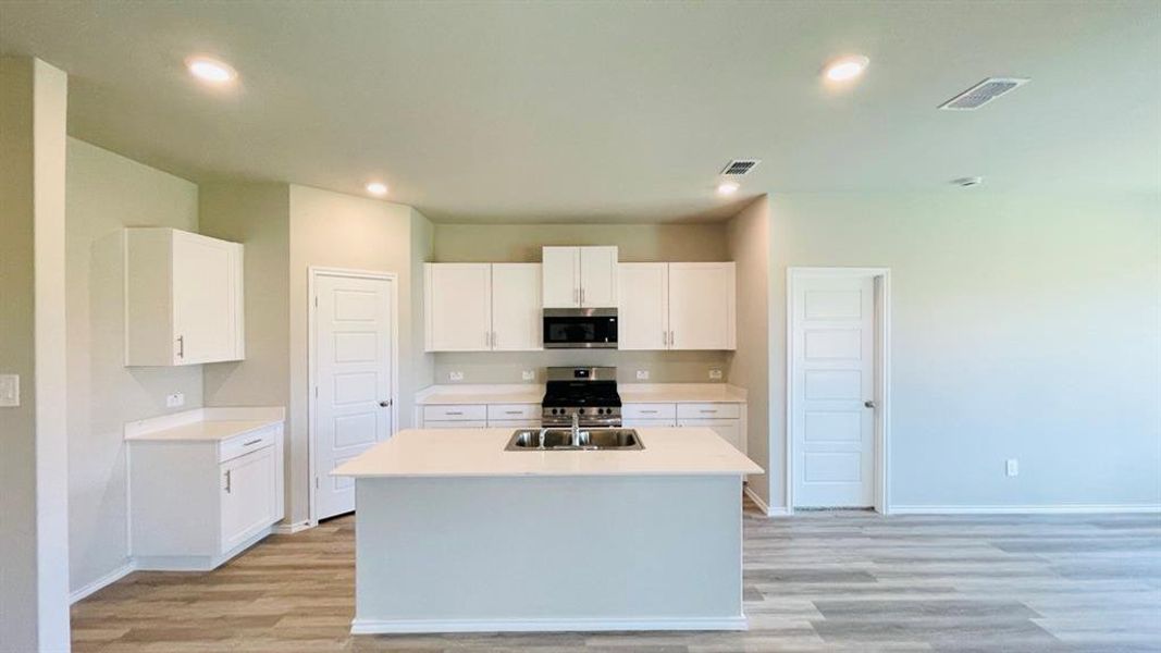 Kitchen - All Home and community information, including pricing, included features, terms, availability and amenities, are subject to change at any time without notice or obligation. All Drawings, pictures, photographs, video, square footages, floor plans, elevations, features, colors and sizes are approximate for illustration purposes only and will vary from the homes as built.