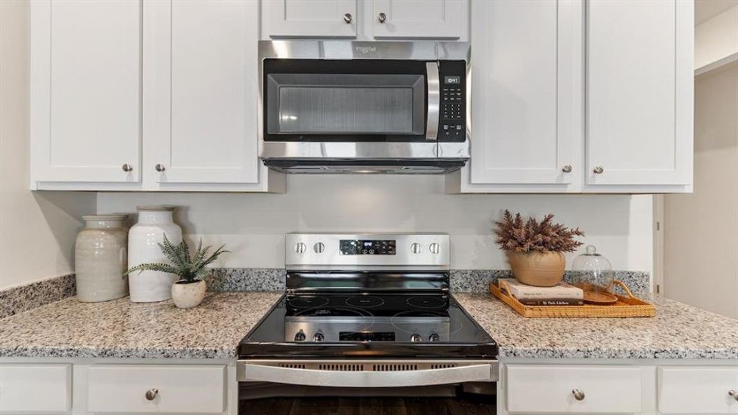 Furnished interior view inside a new home in The Landing at Hidden Lakes, McKinney (Image 14). Furnished interior view inside a new home in The Landing at Hidden Lakes, McKinney (Image 14).