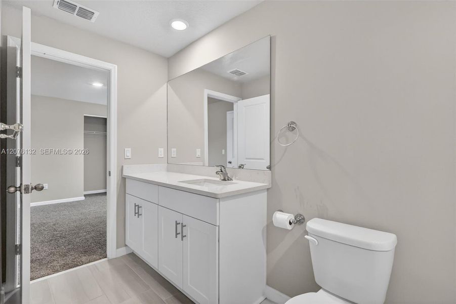 Furnished interior view inside a new home in , Stuart (Image 7).