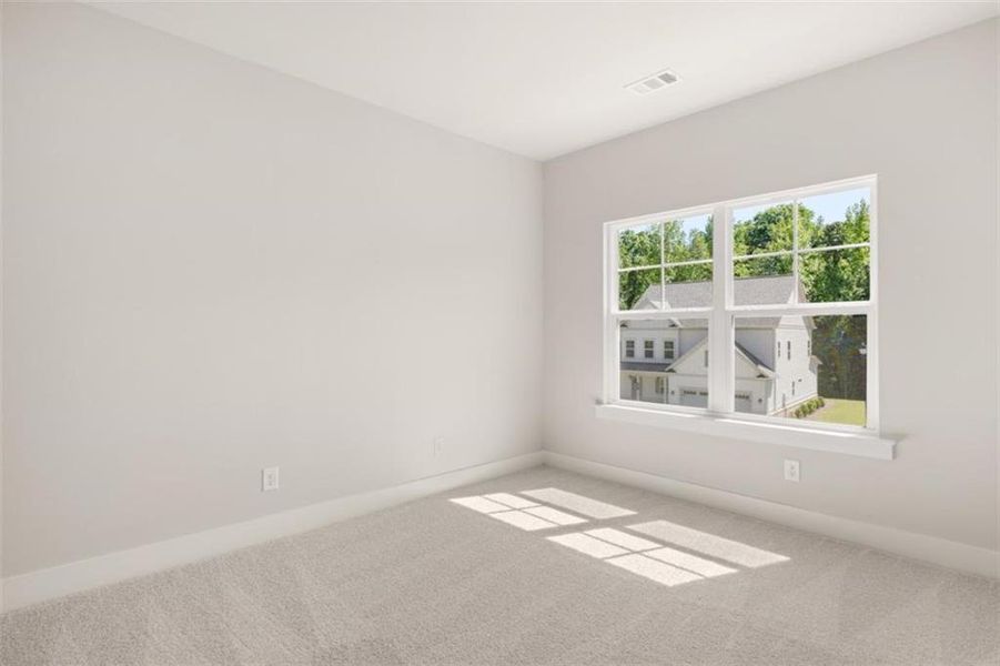 Spacious, unfurnished interior of a new home in Traditions of Braselton, Jefferson (Image 18).