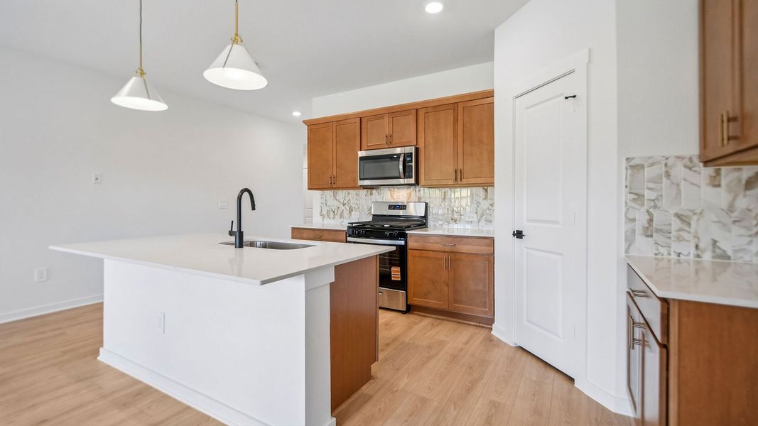 Furnished interior view inside a new home in Trails at Wildhorse, Austin (Image 7).