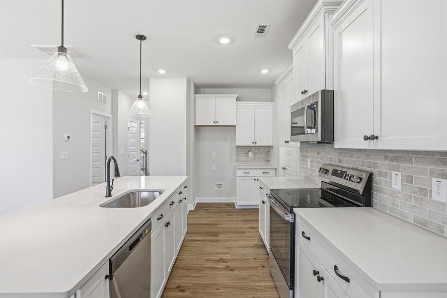 Furnished interior view inside a new home in Renaissance at White Oak, Garner (Image 11).