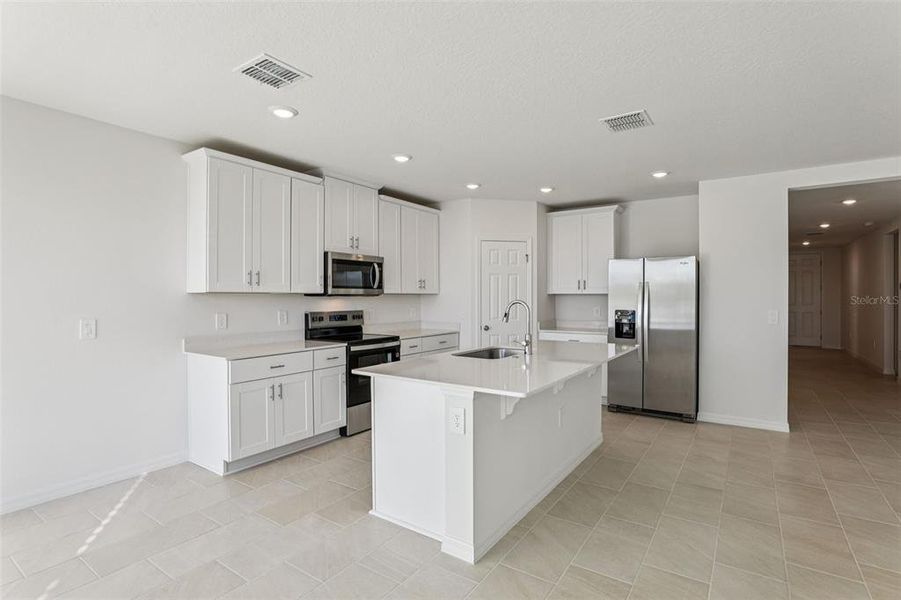 Furnished interior view inside a new home in Lake Deer Estates - Signature Series, Poinciana (Image 11).