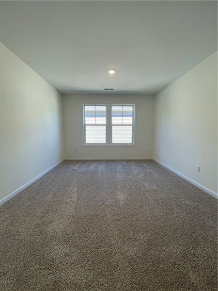 Spacious, unfurnished interior of a new home in Springwood Grove, Central (Image 16).