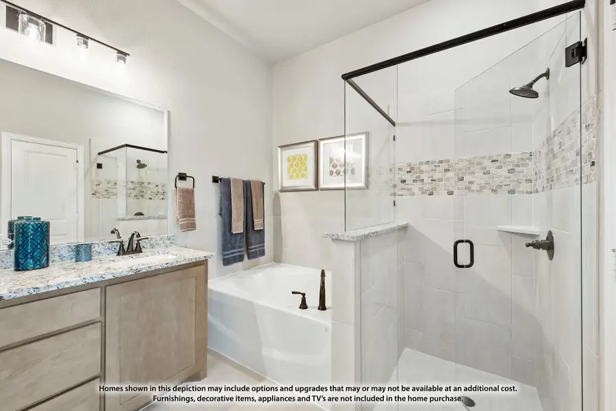Bathroom with granite vanity, soaking tub, and glass-enclosed walk-in shower with mosaic tile accent strip Bathroom with granite vanity, soaking tub, and glass-enclosed walk-in shower with mosaic tile accent strip