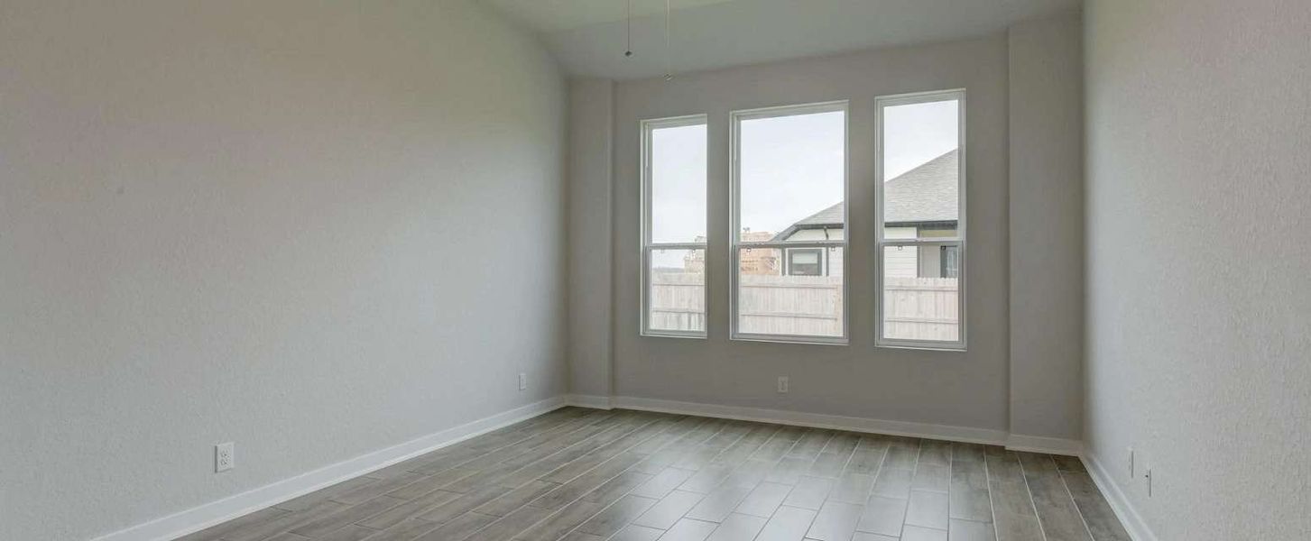 Representative unfurnished interior of a home built from the Guadalupe by Ashton Woods in Saddlebrook Ranch, Schertz (Image 18).