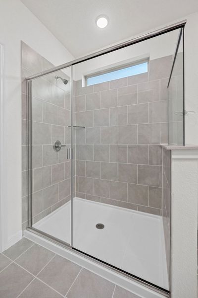 Primary Bath in the Elm home plan by Trophy Signature Homes – REPRESENTATIVE PHOTO
