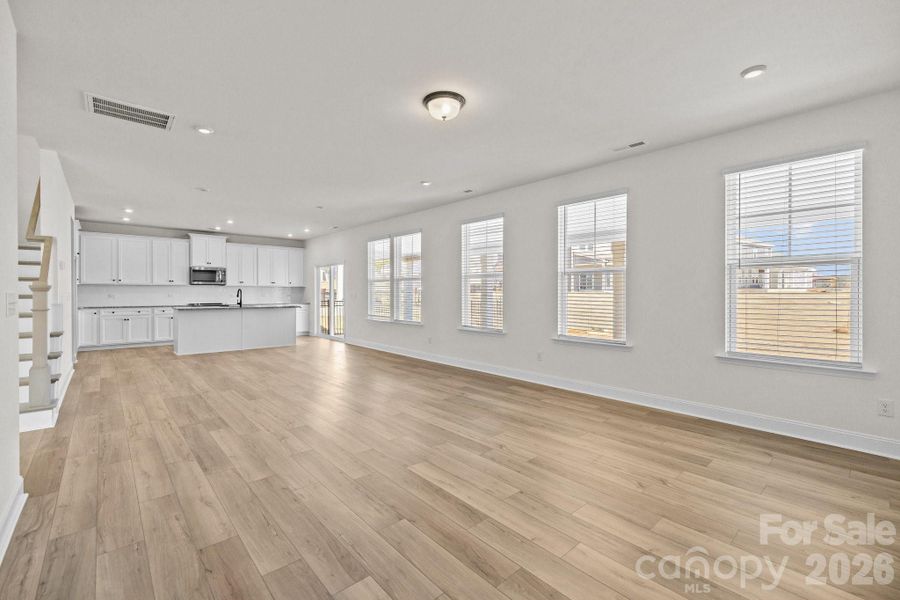 Family Room Looking Into KitchenPhotos are representative and may not reflect the exact home, finishes, or features.
