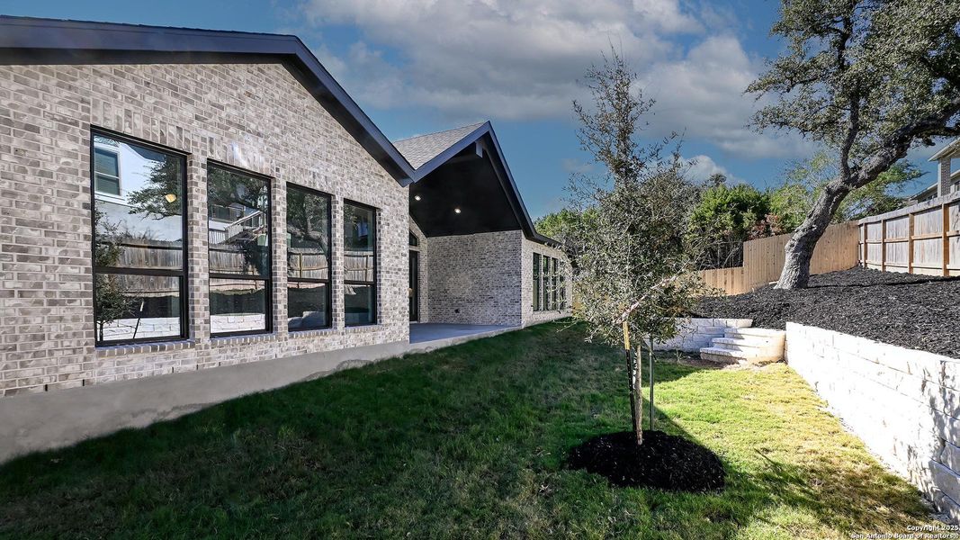 Exterior details and patio area of a home in Kinder Ranch 70', San Antonio (Image 26). Exterior details and patio area of a home in Kinder Ranch 70', San Antonio (Image 26).