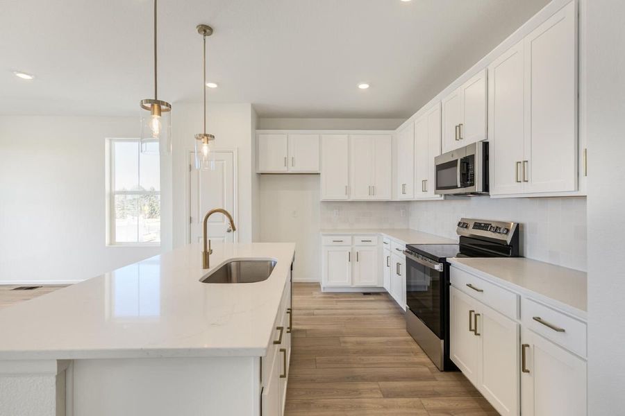 Furnished interior view inside a new home in Murphy Creek Reserve, Aurora (Image 4).
