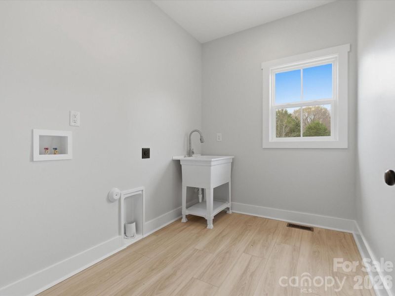 Spacious, unfurnished interior of a new home in , Bessemer City (Image 25).