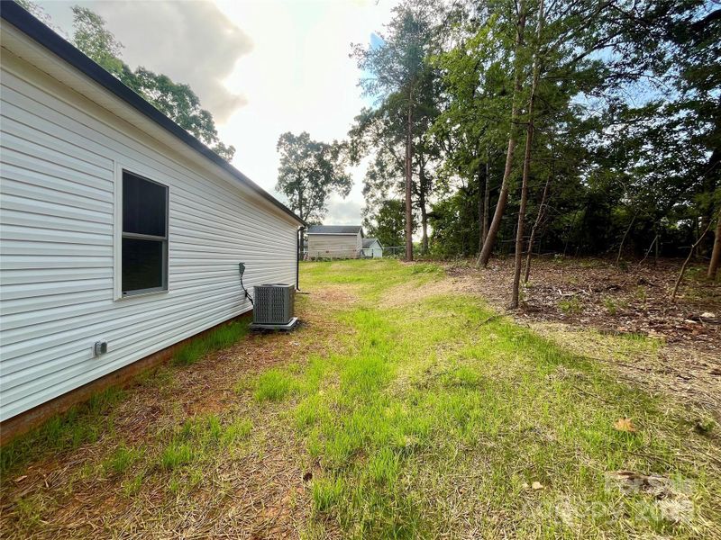 Front exterior of a new home in , Granite Falls, NC, highlighting curb appeal (Image 19).