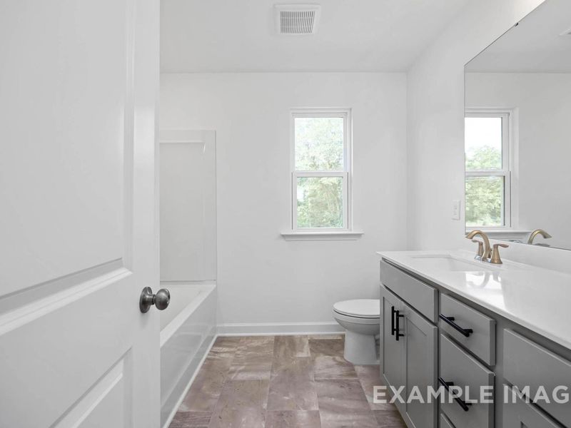 Furnished interior view inside a new home in Woodland Crossing, Zebulon (Image 9).
