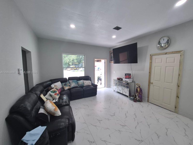 Furnished interior view inside a new home in , Clewiston (Image 8).