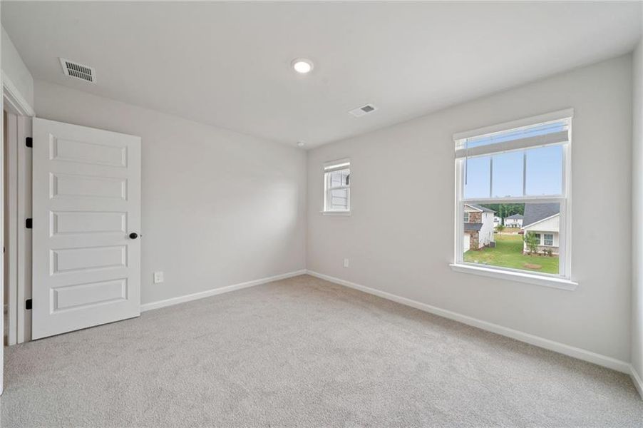 Spacious, unfurnished interior of a new home in Vines at Mill Creek - Estate Series, Braselton (Image 43).