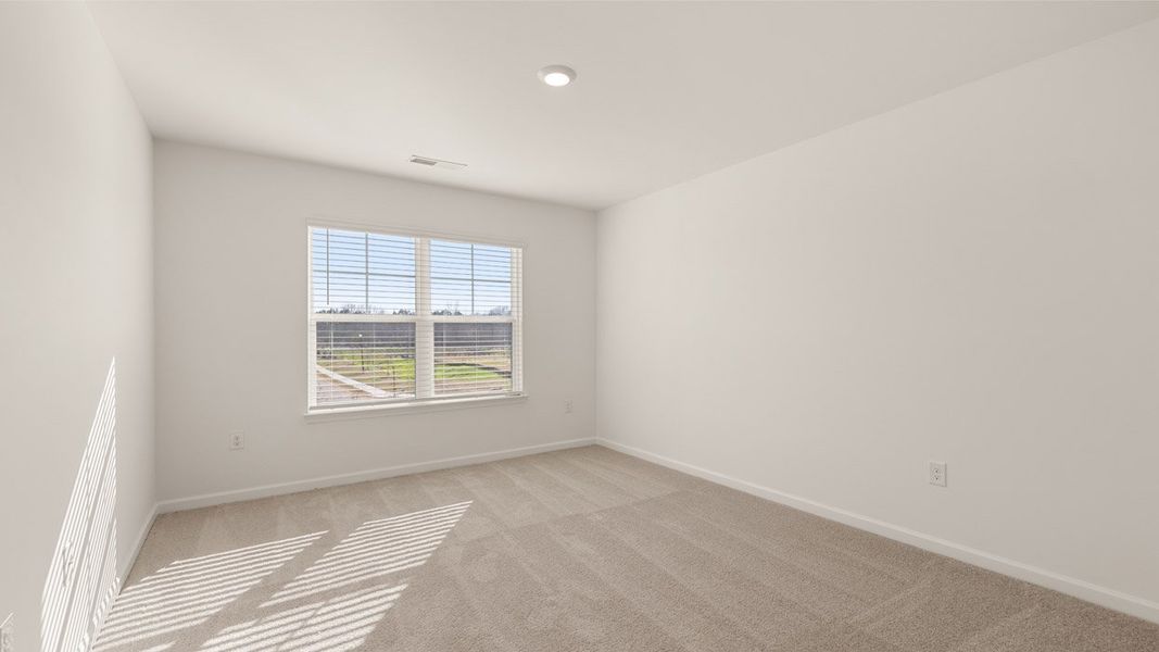 Representative unfurnished interior of a home built from the Edison by D.R. Horton in Heritage Pointe, Senoia (Image 24).