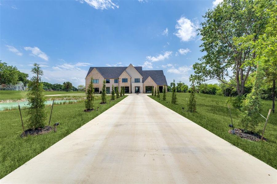 View of front of home featuring a front lawn