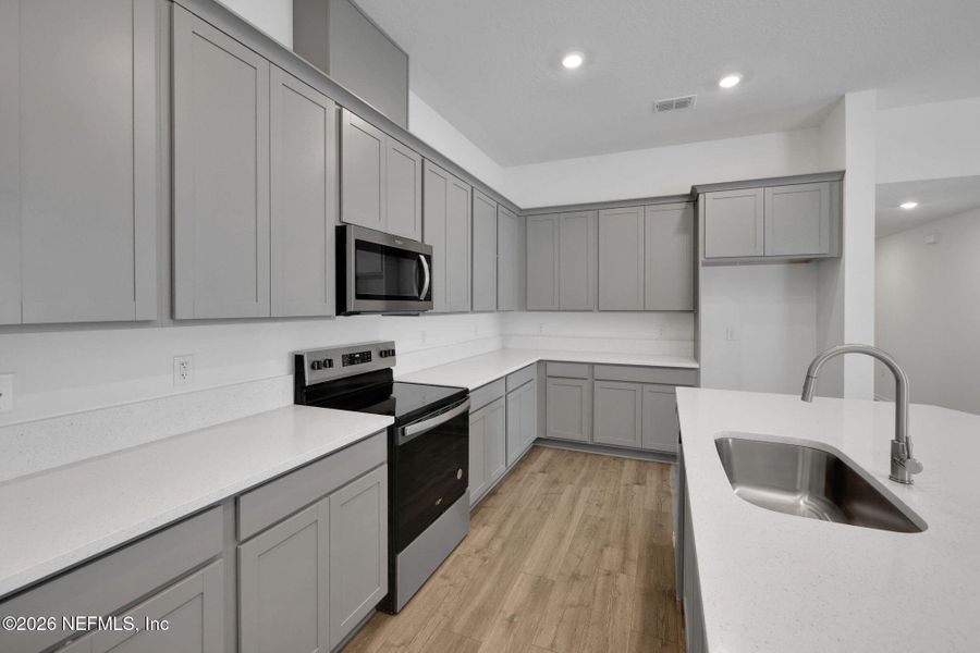 Furnished interior view inside a new home in Amberly, Green Cove Springs (Image 15).