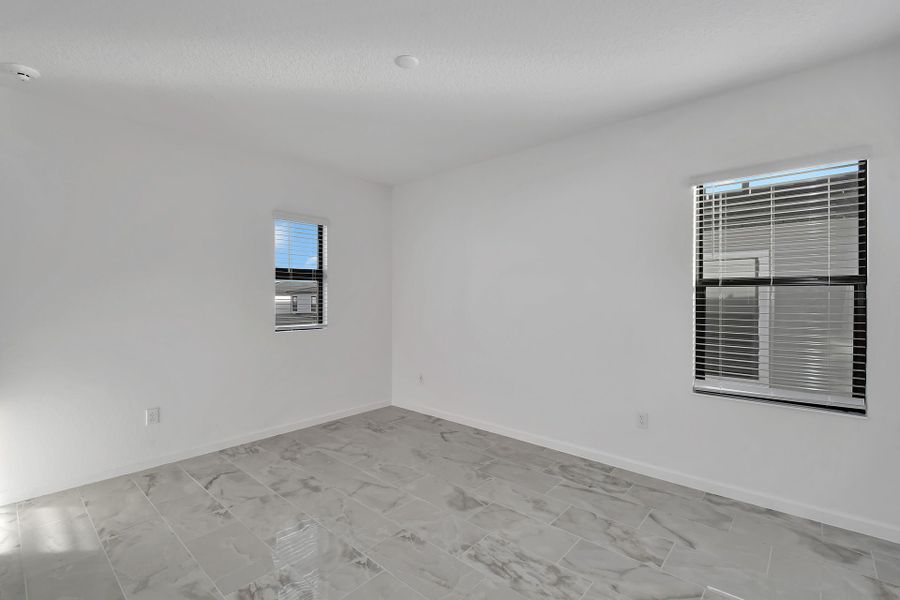 Representative unfurnished interior of a home built from the Sandalwood II by Park Square Residential in Paradiso Grande, Orlando (Image 19).
