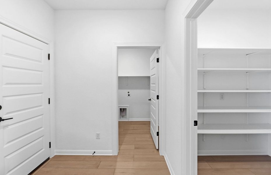 Spacious, unfurnished interior of a new home in West Cypress Hills, Spicewood (Image 21).