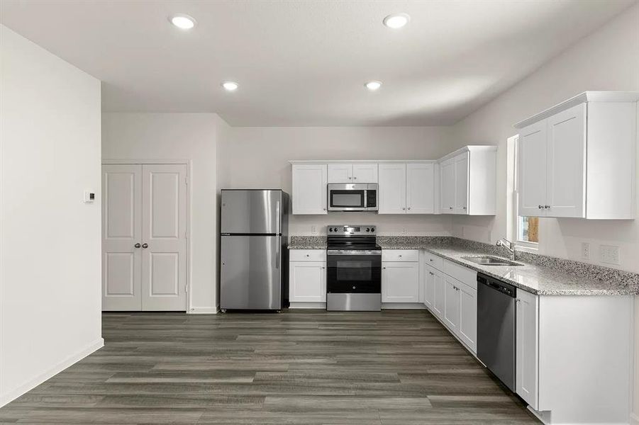 Furnished interior view inside a new home in Meadow Park, Melissa (Image 6).