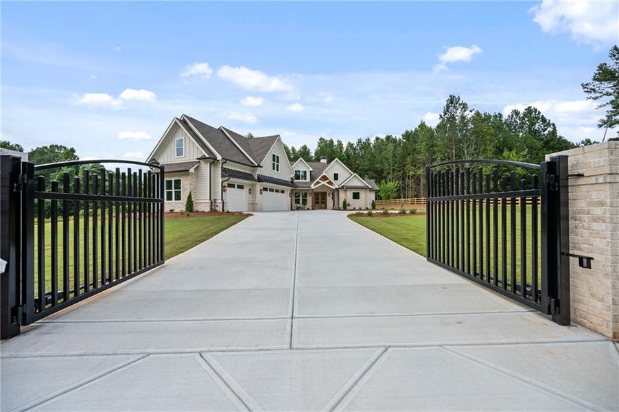 Front exterior of a new home in , Loganville, GA, highlighting curb appeal (Image 2). Front exterior of a new home in , Loganville, GA, highlighting curb appeal (Image 2).