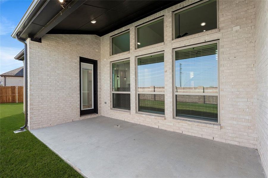 Exterior details and patio area of a home in Collinsbrook Farm, Frisco (Image 20).