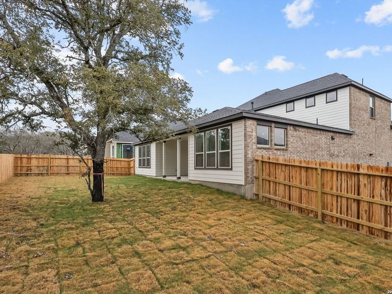Exterior details and patio area of a home in The Reserve at Potranco Oaks, Castroville (Image 30).