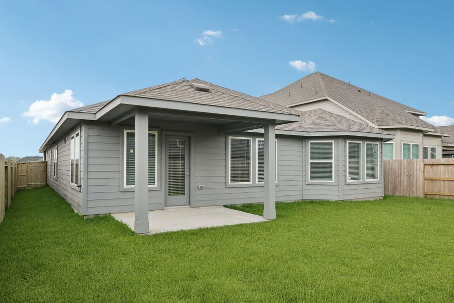 Exterior details and patio area of a home in Riviera Pines - Classic Series, Huffman (Image 2). Exterior details and patio area of a home in Riviera Pines - Classic Series, Huffman (Image 2).