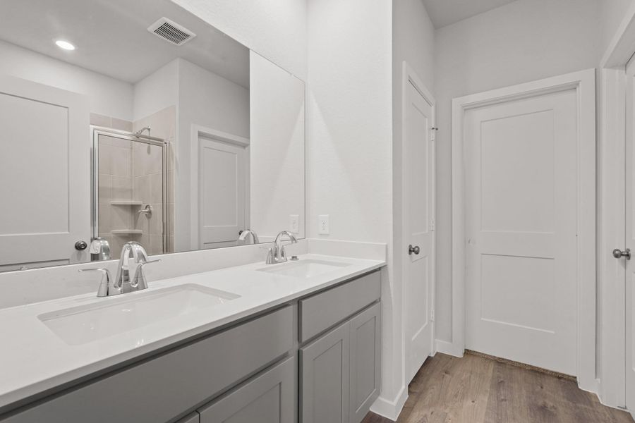 Furnished interior view inside a new home in Lakes at Black Oak, Magnolia (Image 9). Furnished interior view inside a new home in Lakes at Black Oak, Magnolia (Image 9).