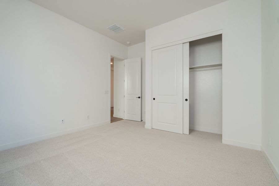 Spacious, unfurnished interior of a new home in Waterston Central, Gilbert (Image 15).