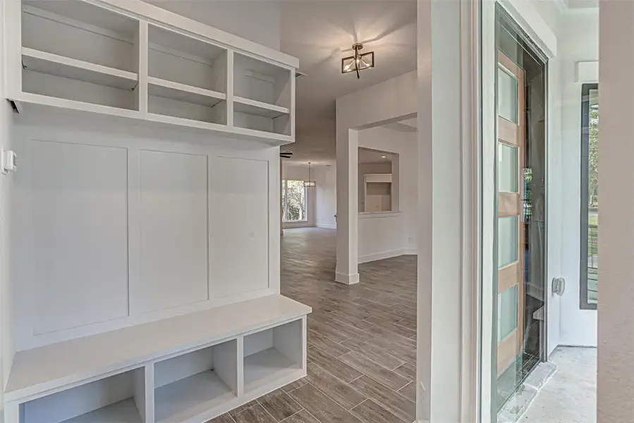 Mudroom featuring wood tiled floors Mudroom featuring wood tiled floors