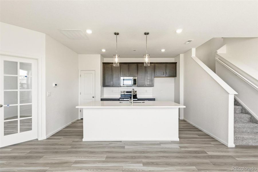 Furnished interior view inside a new home in Turnberry, Commerce City (Image 10).