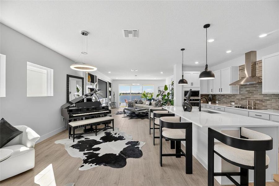 Furnished interior view inside a new home in The Peninsula at Rhodine Lake, Riverview (Image 9).