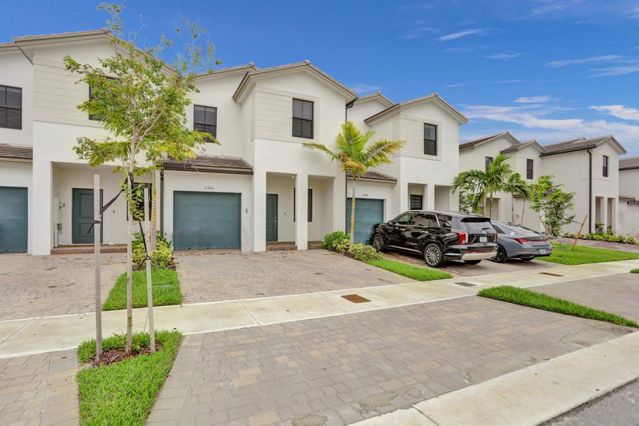 Front exterior of a new home in , Miami, FL, highlighting curb appeal (Image 2). Front exterior of a new home in , Miami, FL, highlighting curb appeal (Image 2).