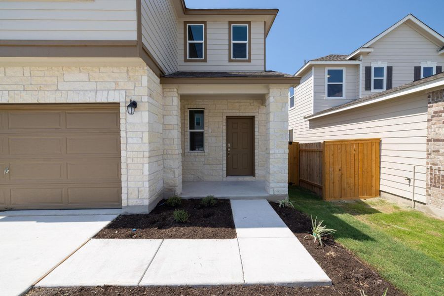 Exterior details and patio area of a home in Sonterra - Cool Water, Jarrell (Image 20).