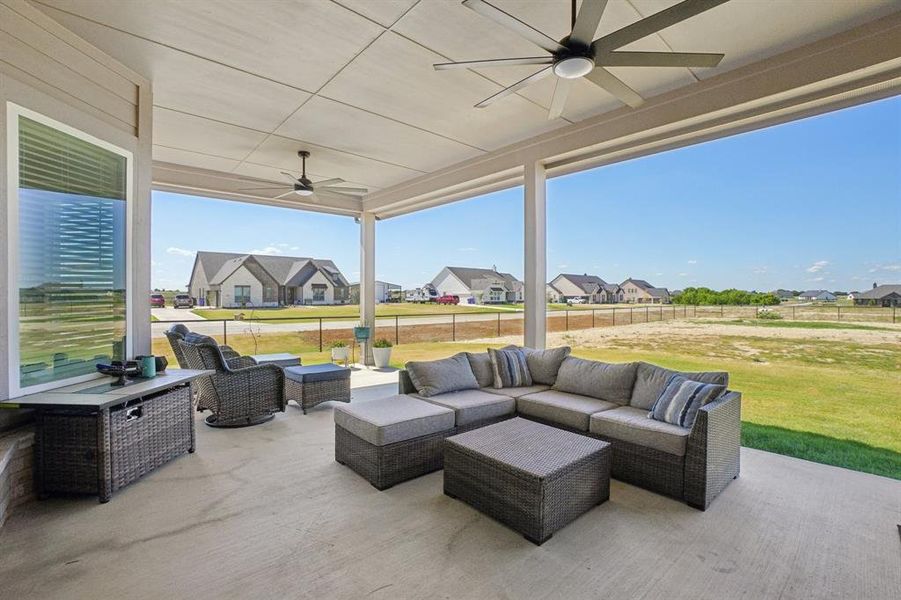 Watch the beautiful sunsets from the large covered patio featuring 2 ceiling fans.