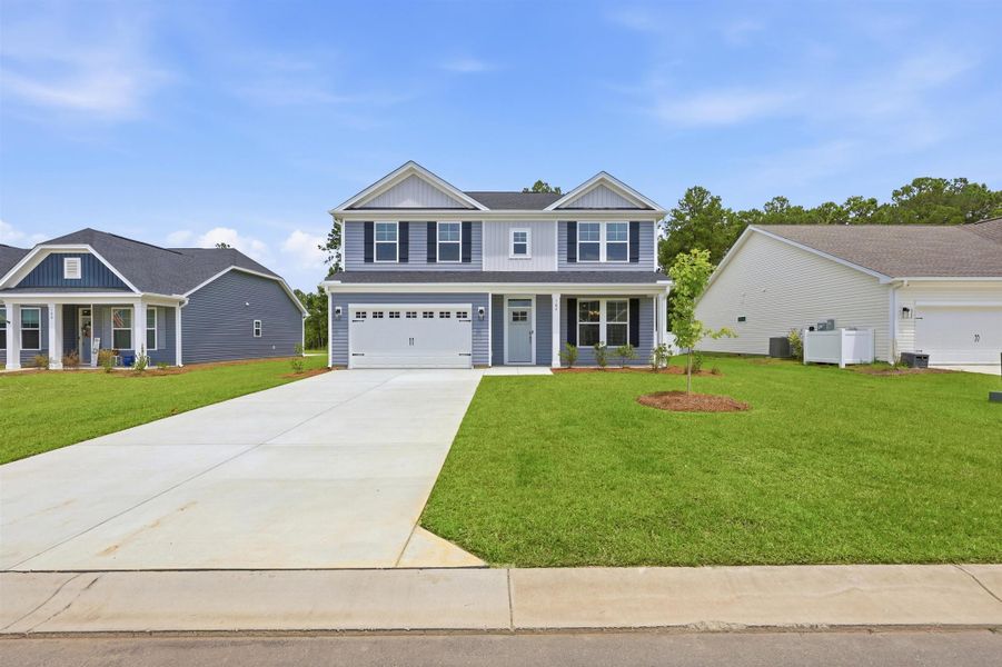 Front exterior of a new home in Westfield, Conway, SC, highlighting curb appeal (Image 31).