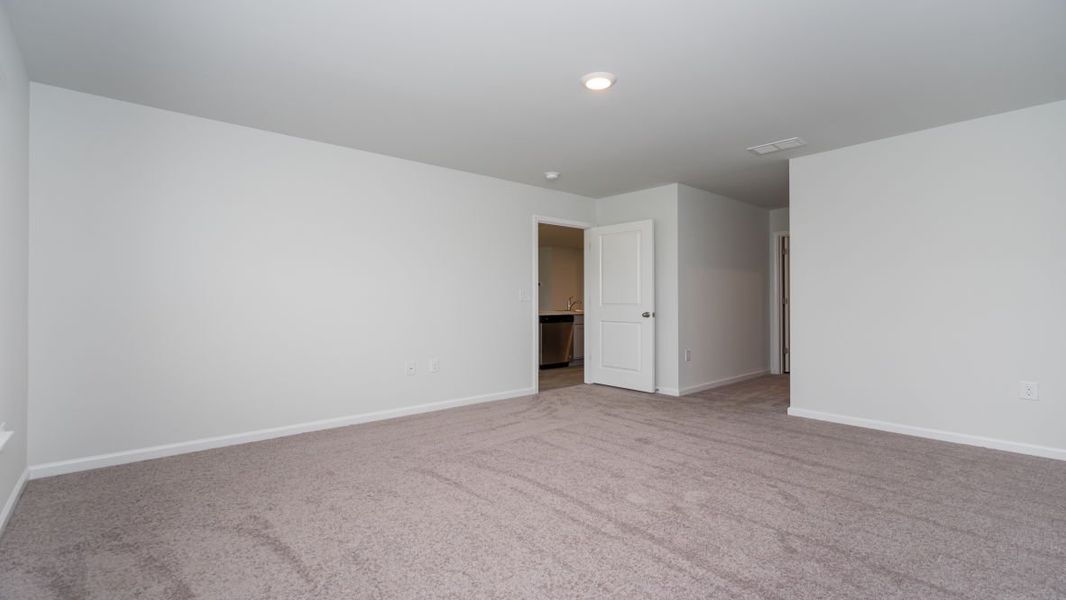 Representative unfurnished interior of a home built from the ARIA by D.R. Horton in The Meadows at Wildwood Village, Shallotte (Image 27). Representative unfurnished interior of a home built from the ARIA by D.R. Horton in The Meadows at Wildwood Village, Shallotte (Image 27).