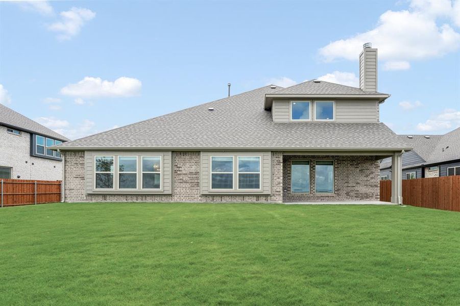 Front exterior of a new home in Timberbrook 4B, Justin, TX, highlighting curb appeal (Image 2). Front exterior of a new home in Timberbrook 4B, Justin, TX, highlighting curb appeal (Image 2).