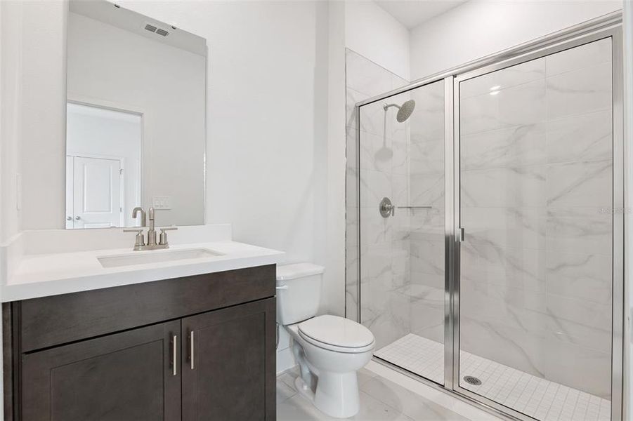 Furnished interior view inside a new home in Eden Crest, Apopka (Image 27).