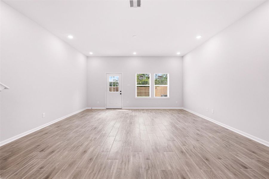 Awesome modern layout on the first floor puts the spacious living room open to the dining area and kitchen.