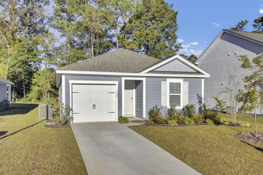 Front exterior of a new home in Center Pointe, Santee, SC, highlighting curb appeal (Image 1). Front exterior of a new home in Center Pointe, Santee, SC, highlighting curb appeal (Image 1).