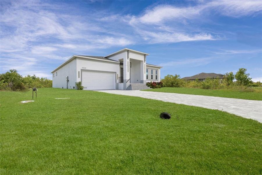 Front exterior of a new home in , Port Charlotte, FL, highlighting curb appeal (Image 30).