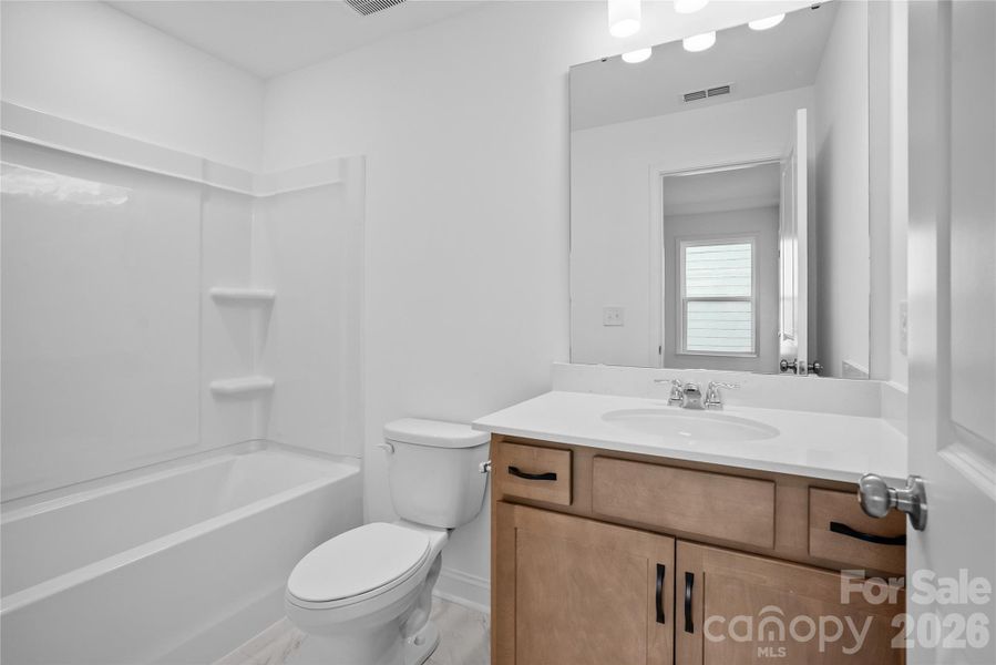 Furnished interior view inside a new home in Elmbrook, Indian Trail (Image 13).