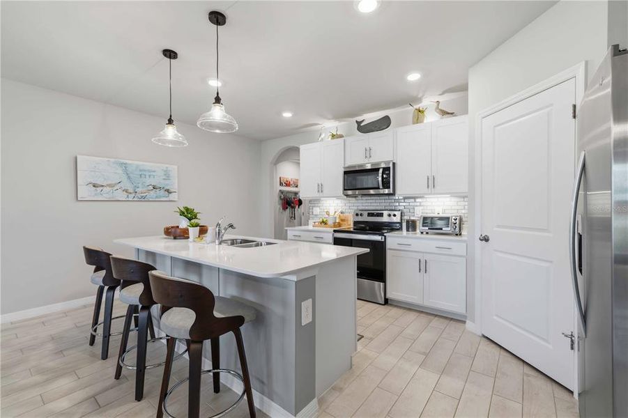 Furnished interior view inside a new home in Burnt Store Village, Punta Gorda (Image 18).