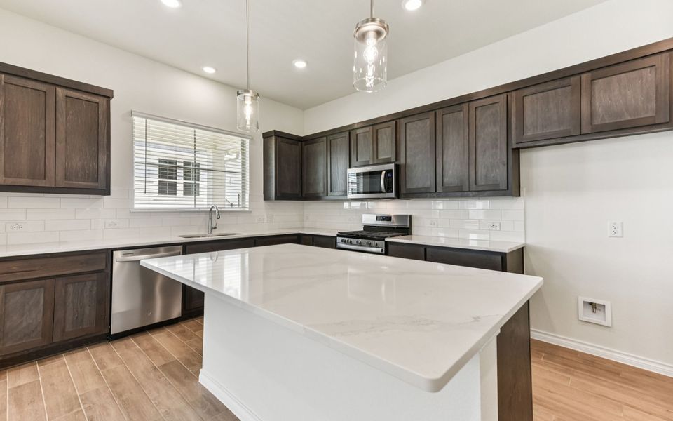 Furnished interior view inside a new home in Villas at Kissing Tree, San Marcos (Image 6).