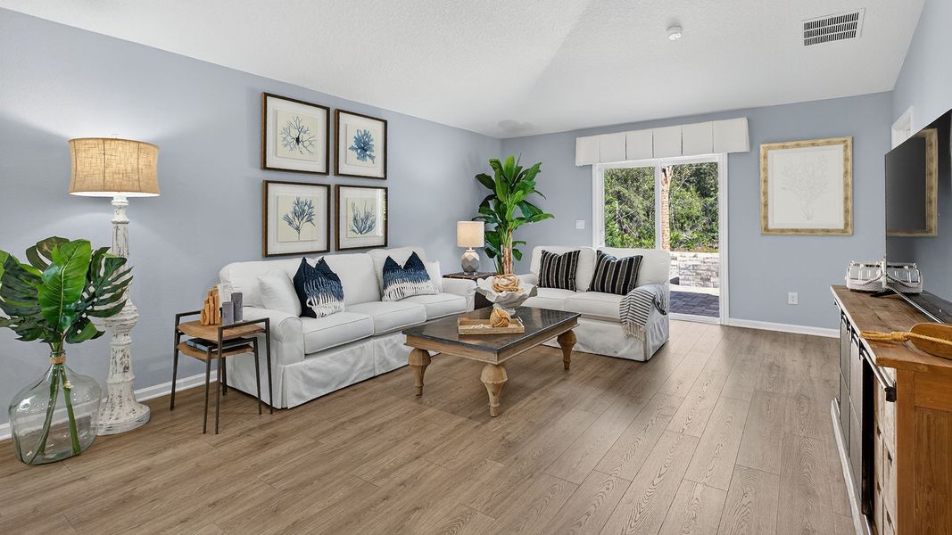 Representative furnished interior of a home built from the Berkeley II by D.R. Horton in Copes Landing, Jacksonville (Image 12).