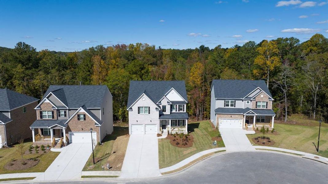 Front exterior of a new home in Water Oak Estates, Lawrenceville, GA, highlighting curb appeal (Image 2).